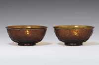 18TH CENTURY AN UNUSUAL PAIR OF MOULDED AMBER GLASS BOWLS